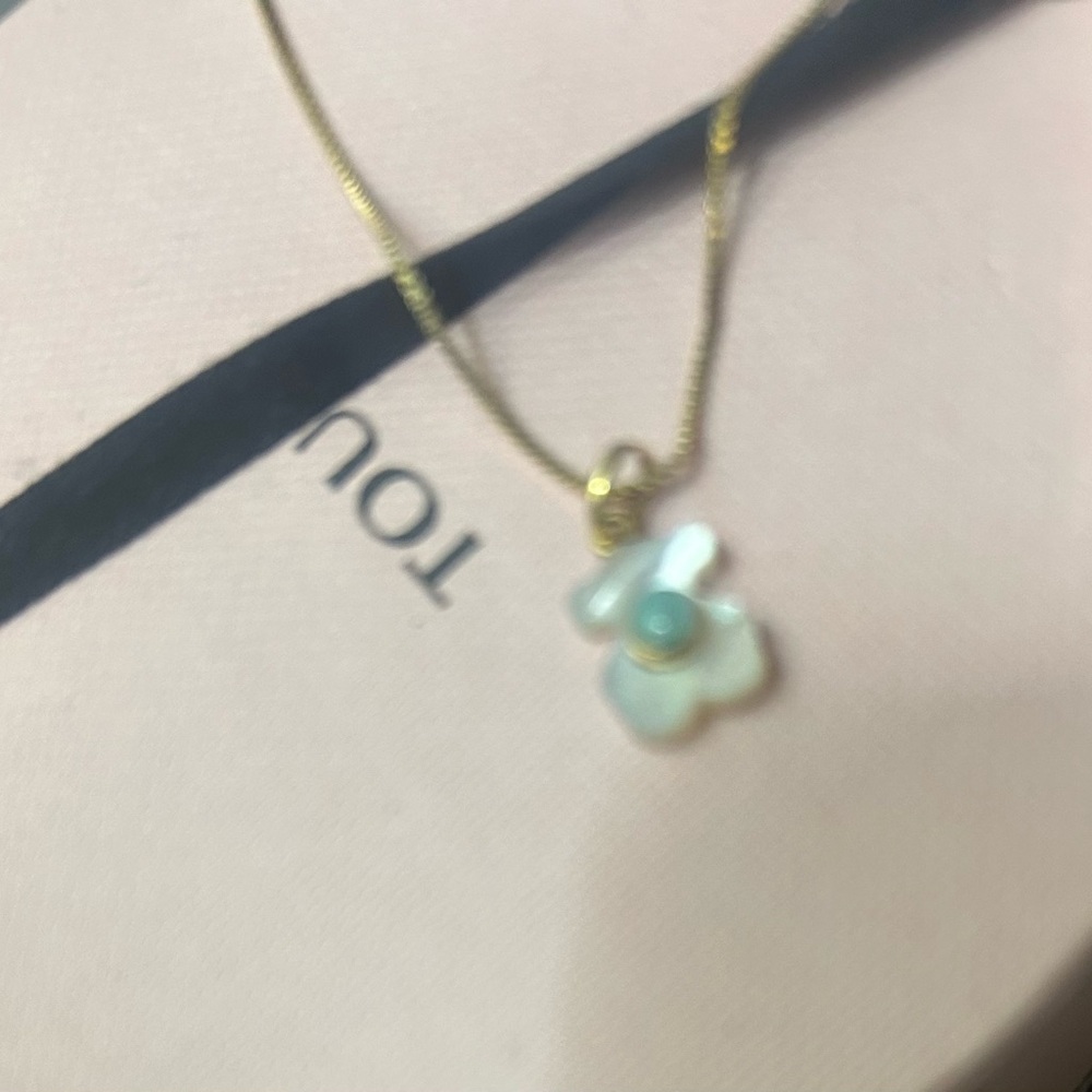 Tous mother pearl pendant.